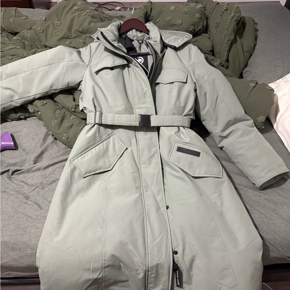 It was flown in from Canada last year and never worn. I don't wear